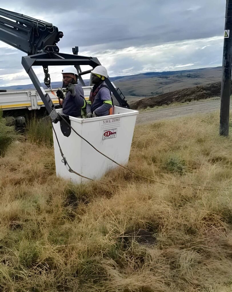 Electrical Engineers working on a street pole