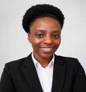 lady wearing a black blazer and white shirt