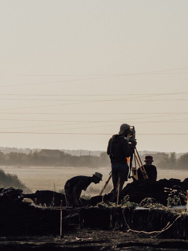 Three engineers on a construction site